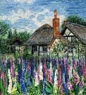 Lupin Cottage, an earlier thread painting by Mitra McQuilton