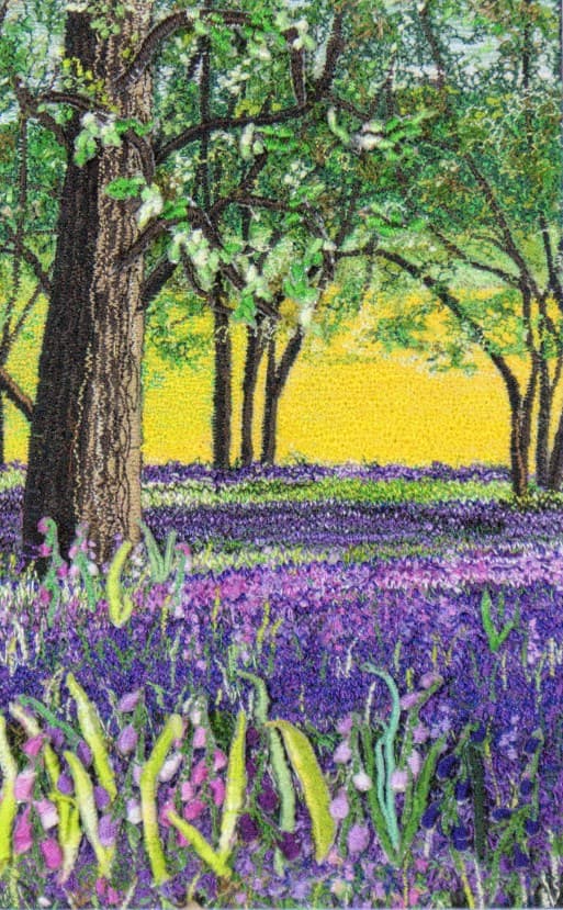 Rapeseed Field & Bluebells, an earlier thread painting by Mitra McQuilton